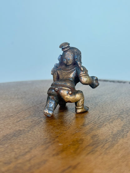 Crawling krishna - bronze idol