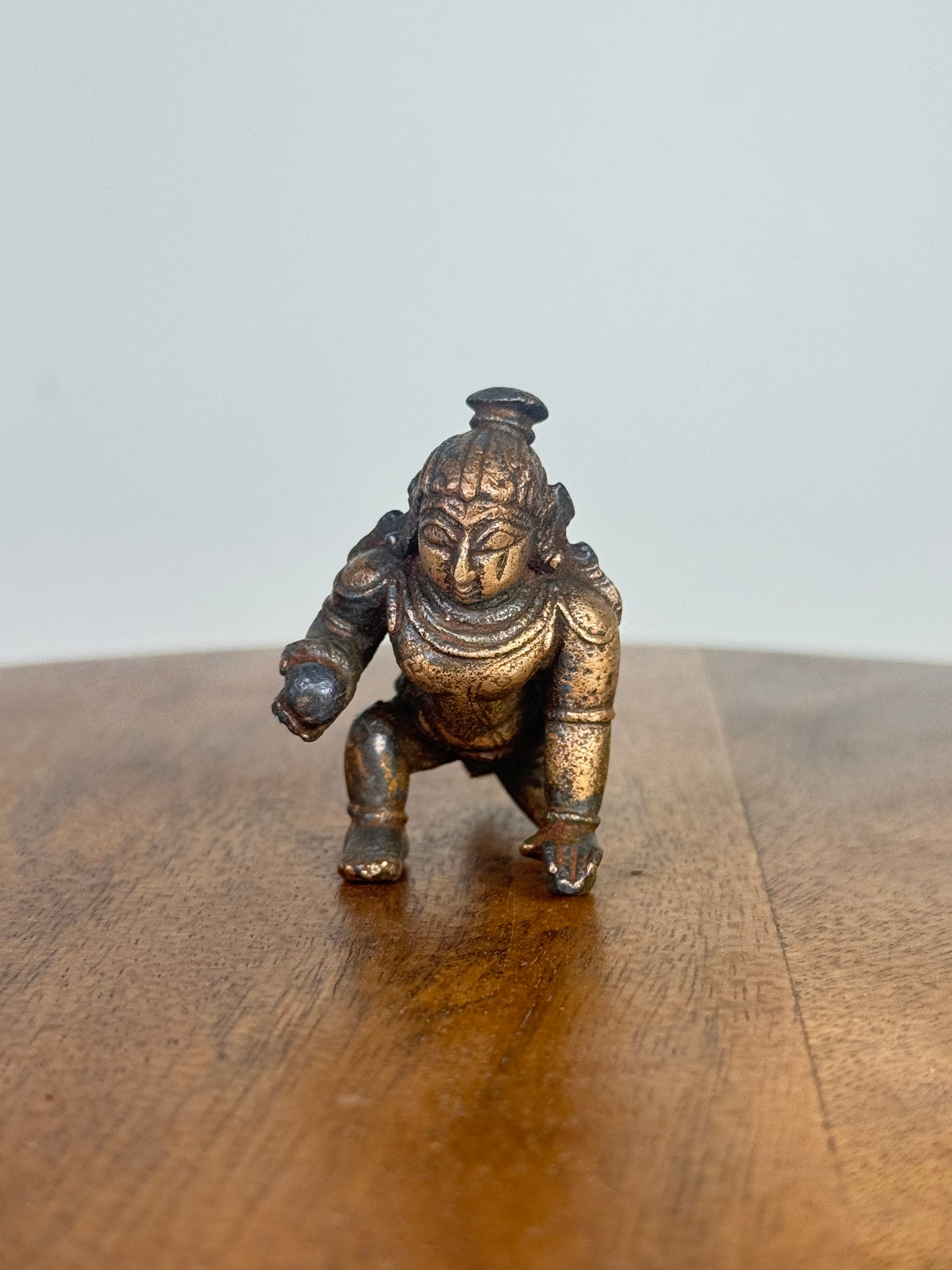 Crawling krishna - bronze idol