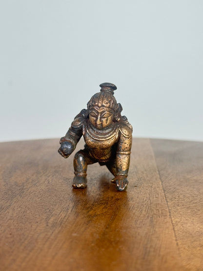 Crawling krishna - bronze idol
