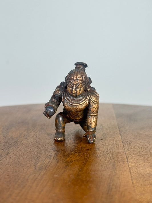 Crawling krishna - bronze idol