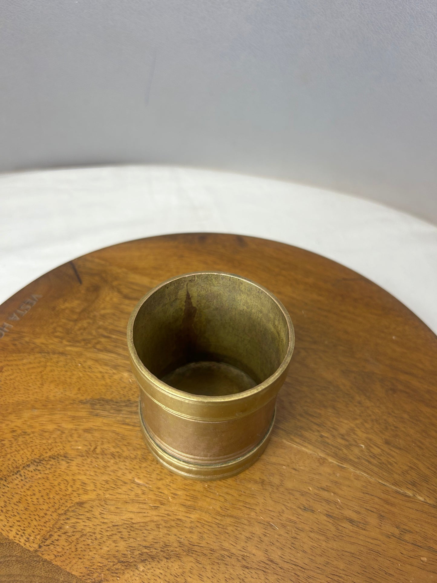 Vintage  bronze  measure