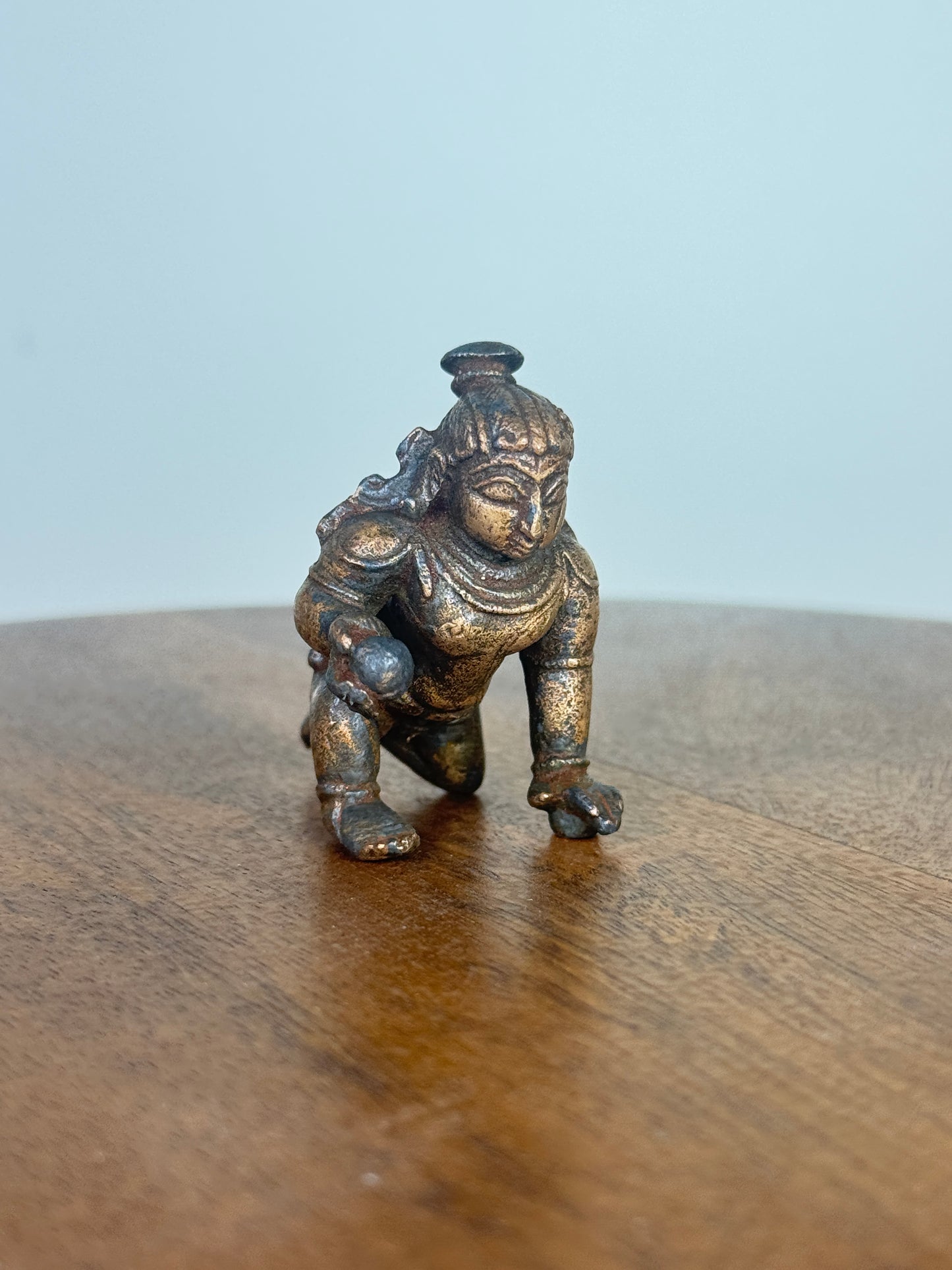 Crawling krishna - bronze idol