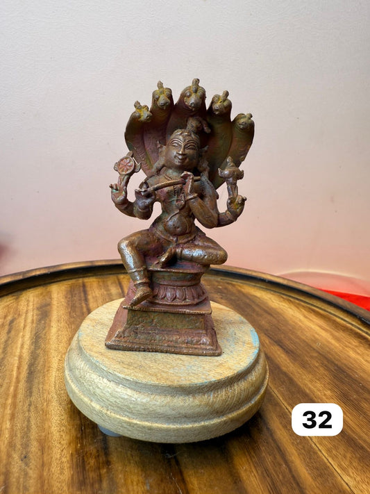 Chaturbuja sitting krishna - museum replicated copper idol