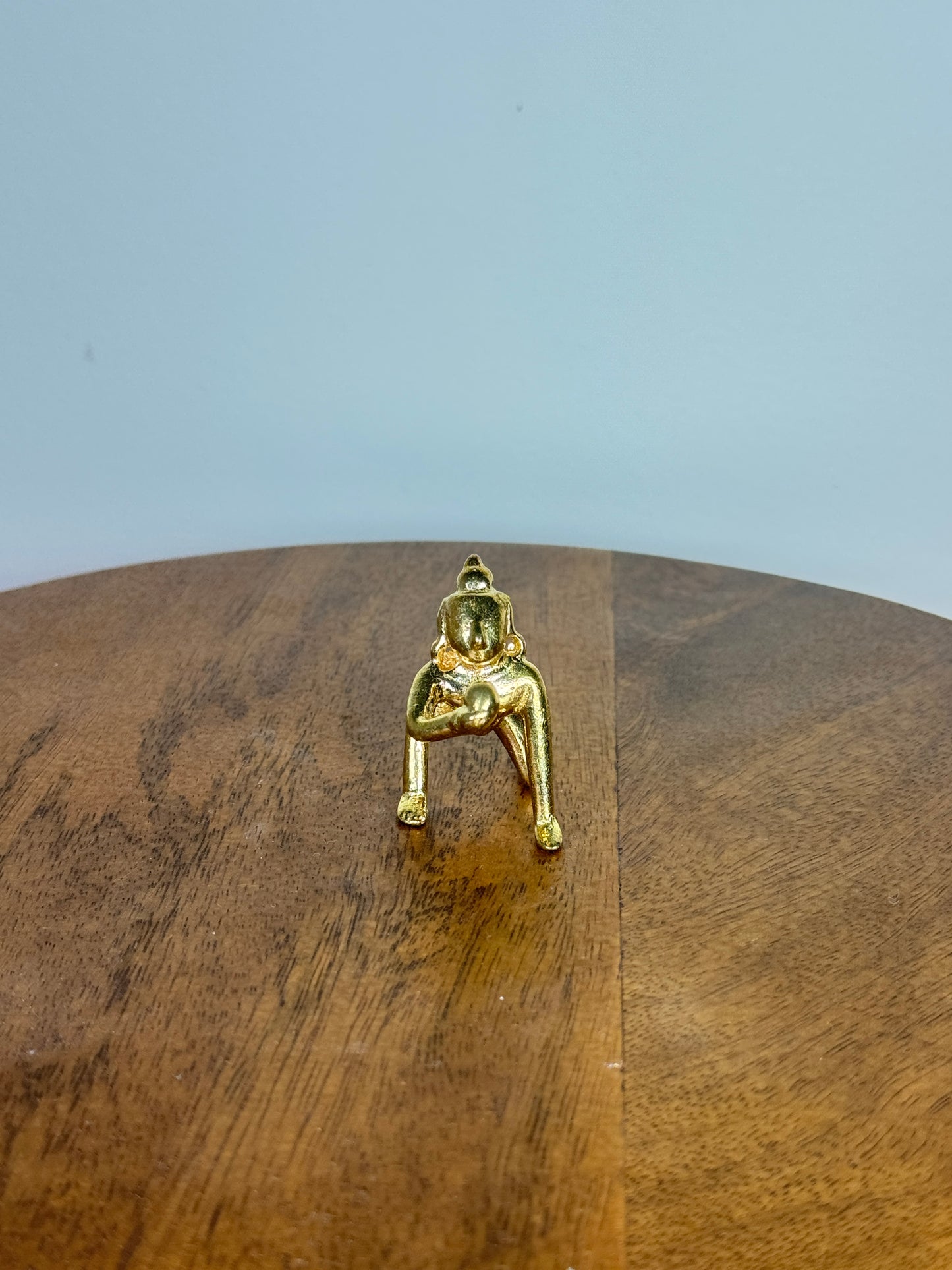 Crawling butter ball Krishna idol made of panchaloha