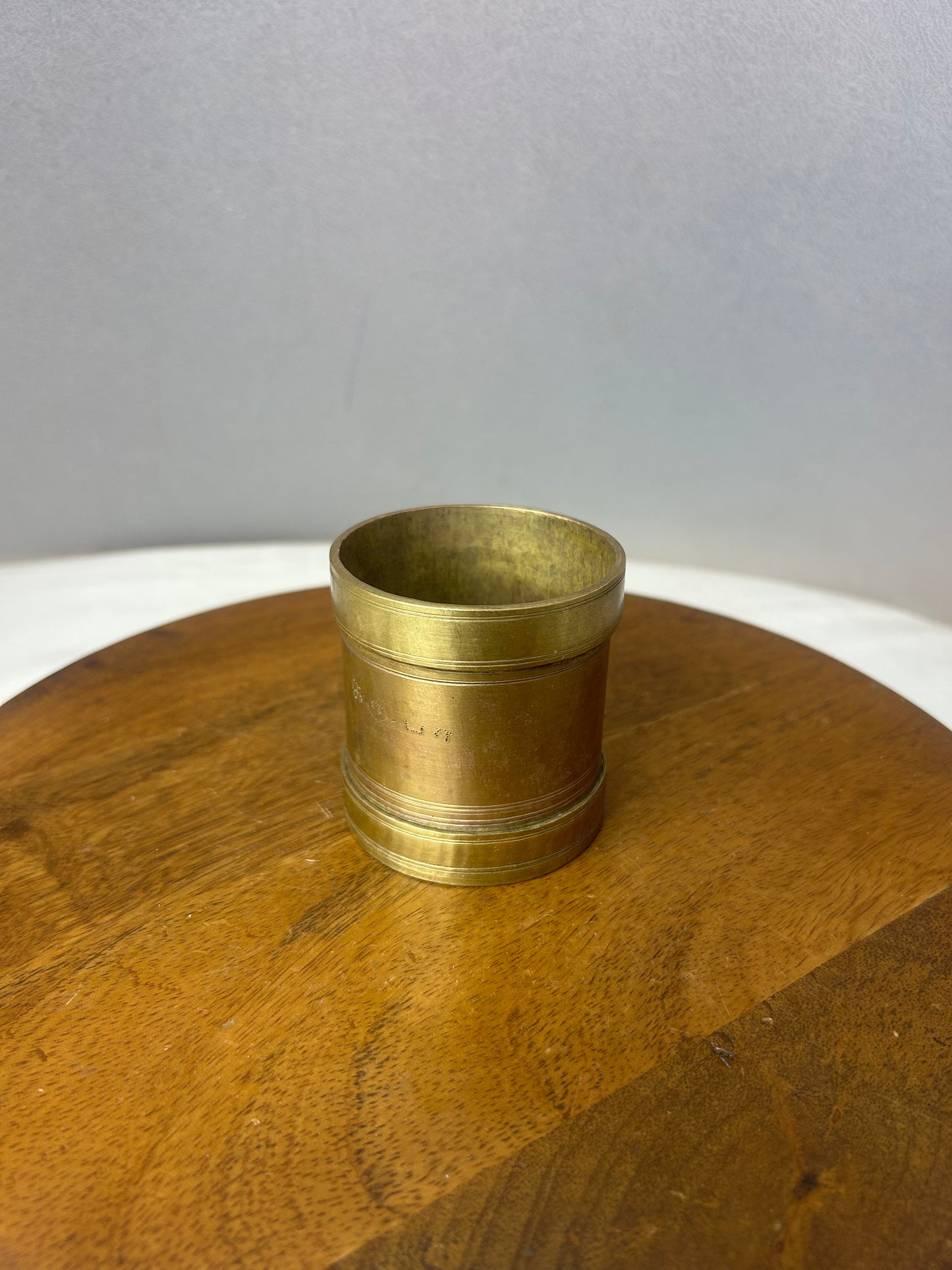 Vintage  bronze  measure