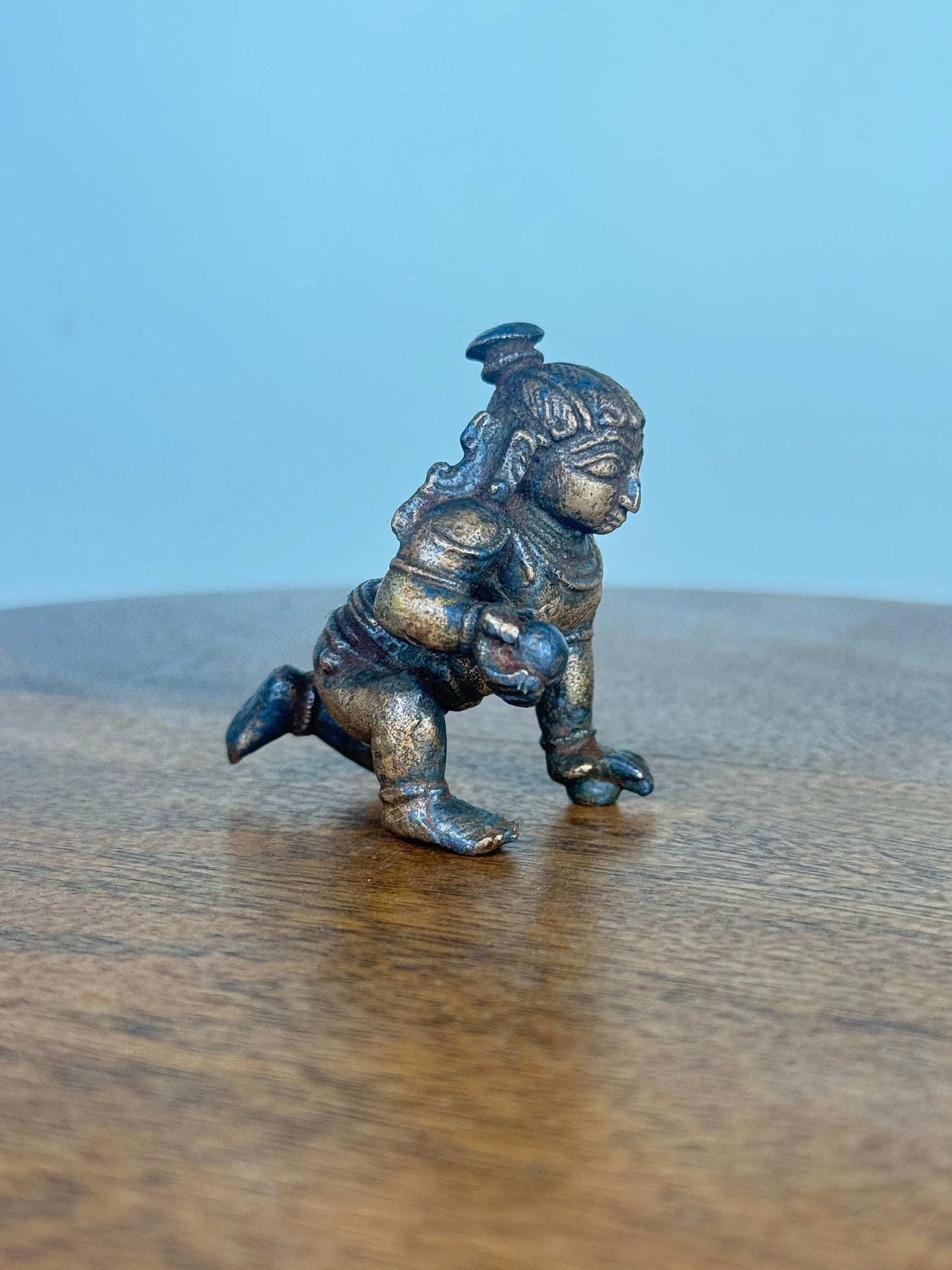Crawling krishna - bronze idol