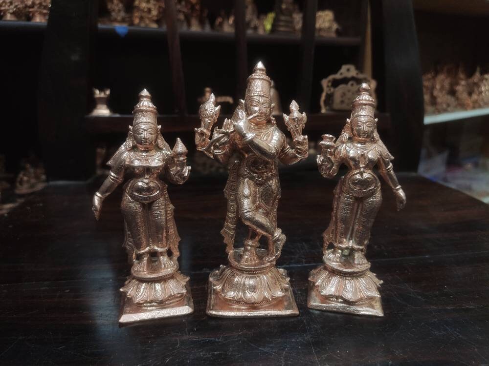 Prasiddh copper idols present copper idol of chaturbhuja krishna (venugopala swamy)with rukmini and satyabama