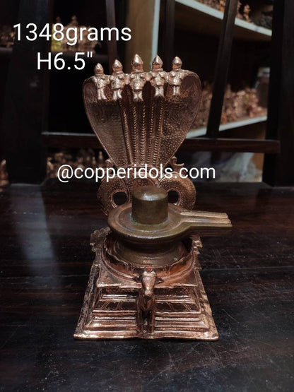 Prasiddh copper idols present copper idol of shivalinga with nandi peeta prabhavali