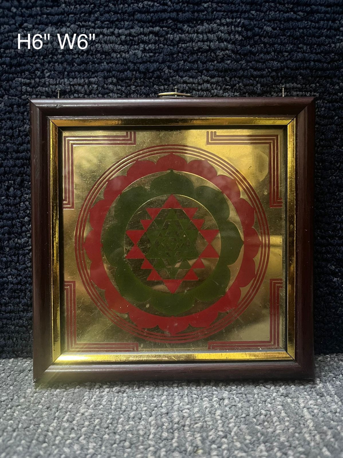 Prasiddh copper idols present brass Shree yantra plate