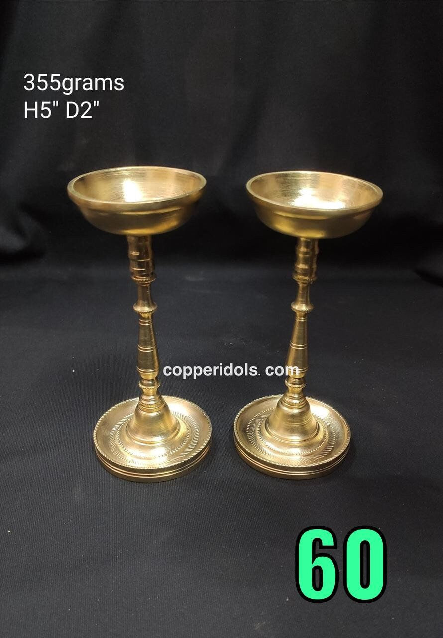 prasiddh copper idols present Panchaloha lamps