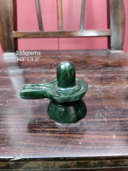 Prasiddh copper idols present green colour gem stone linga