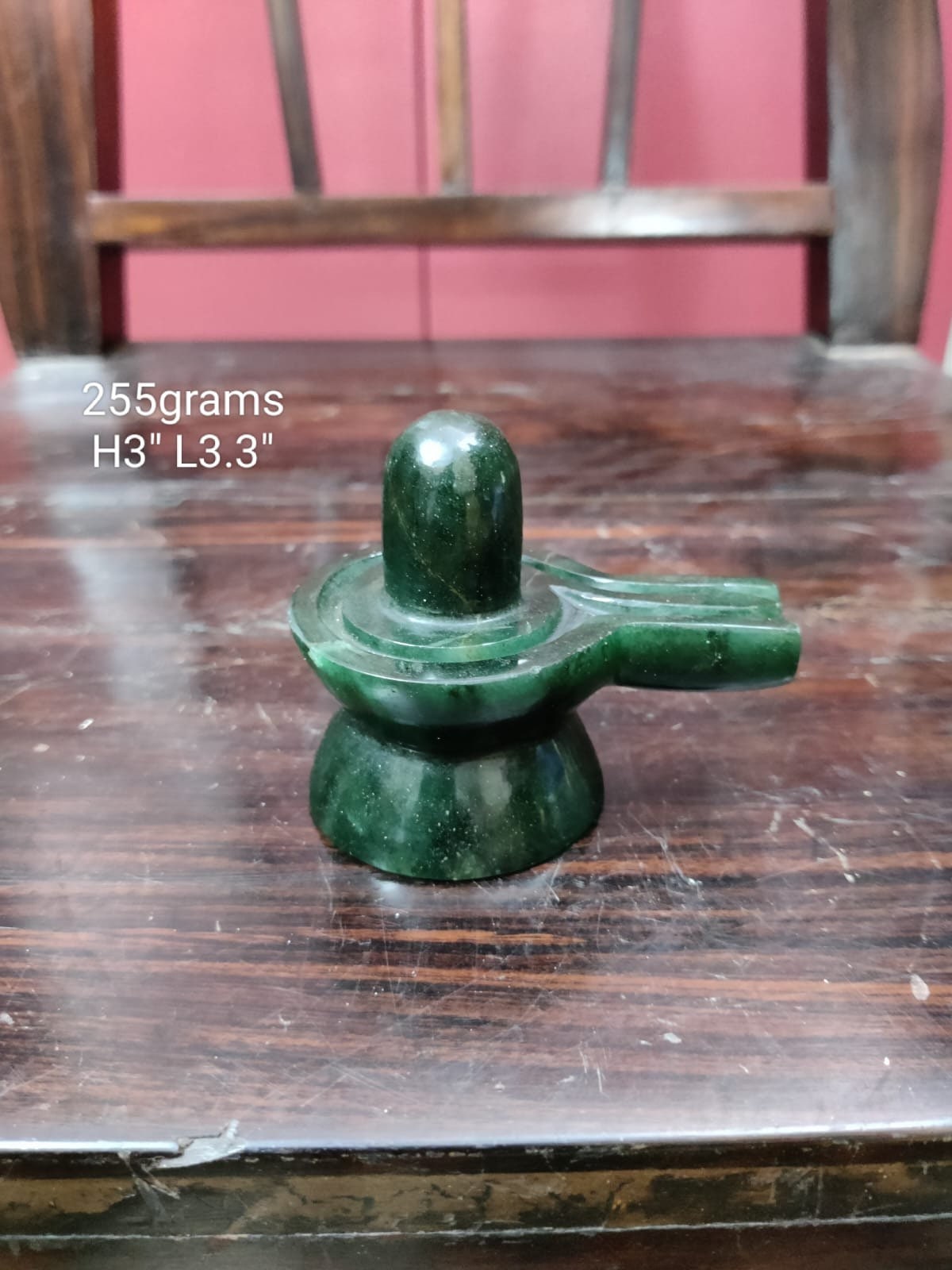 Prasiddh copper idols present green colour gem stone linga