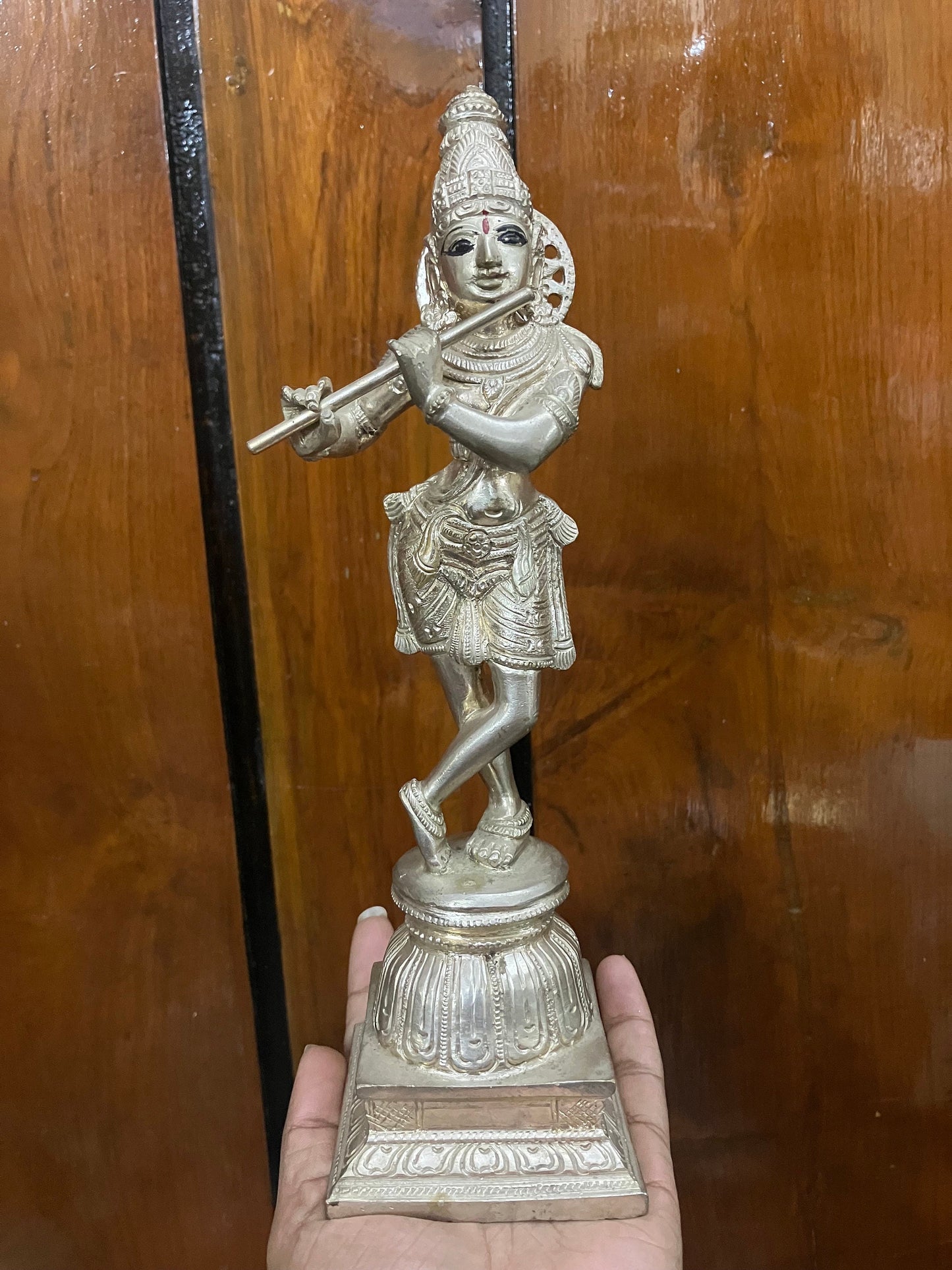 brass cast krishna idol with silver polish