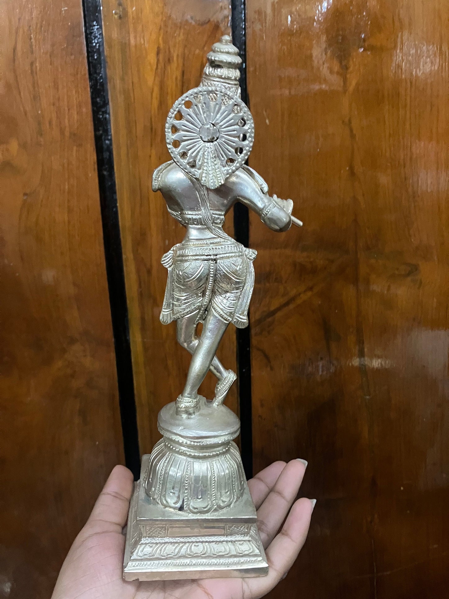 brass cast krishna idol with silver polish