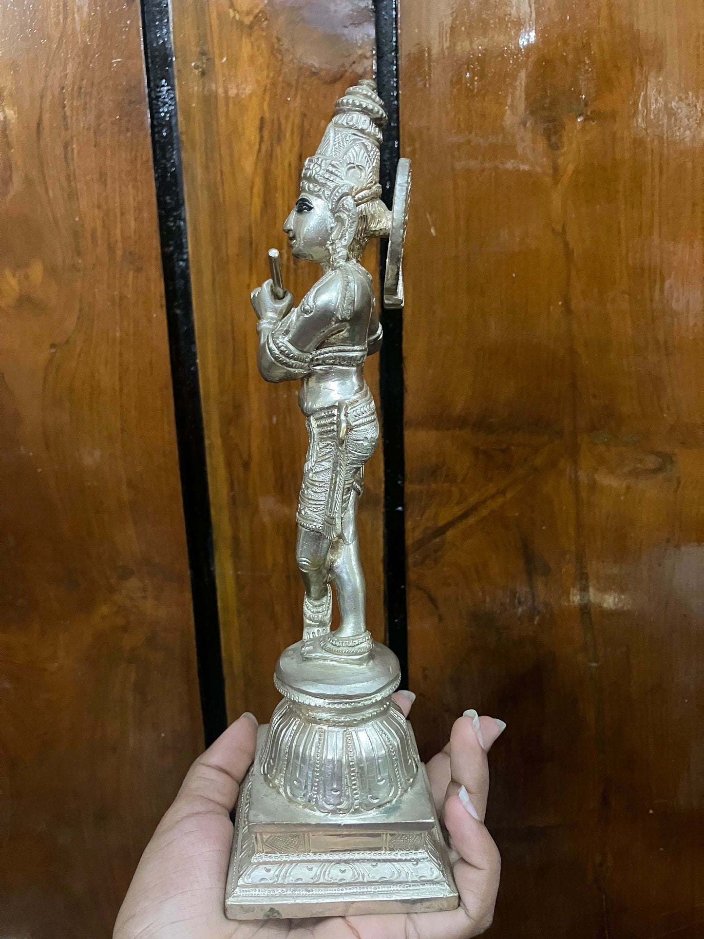 brass cast krishna idol with silver polish