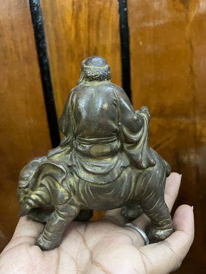 Indian antique store present vintage buddhist figurine