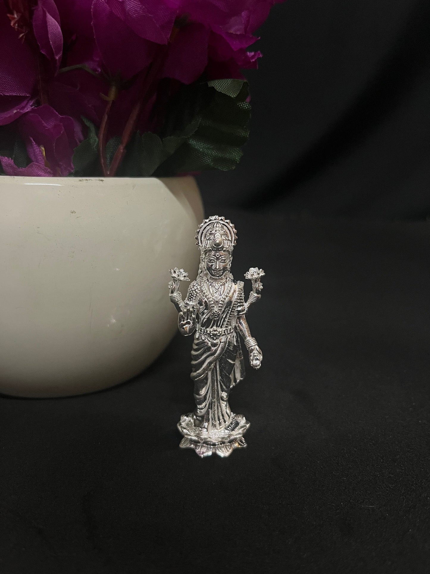 silver made standing lakshmi idol