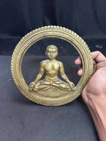 Vintage bronze cast Yoga performing man in a circle souvenir