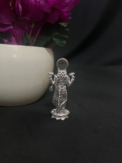 silver made standing lakshmi idol