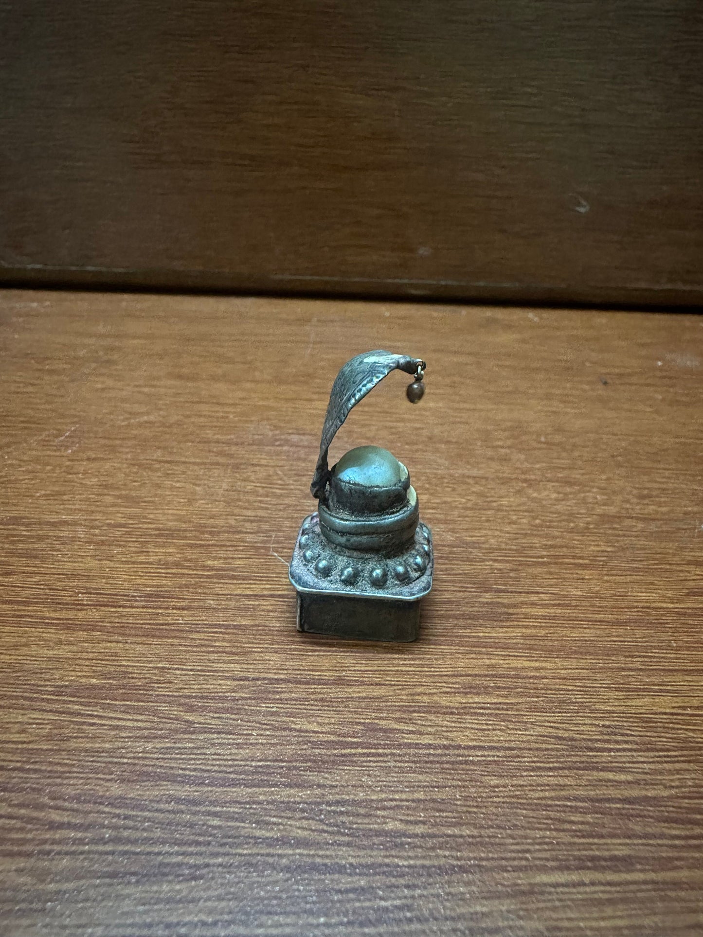 Vintage silver cast naga peeta with pearl linga inside