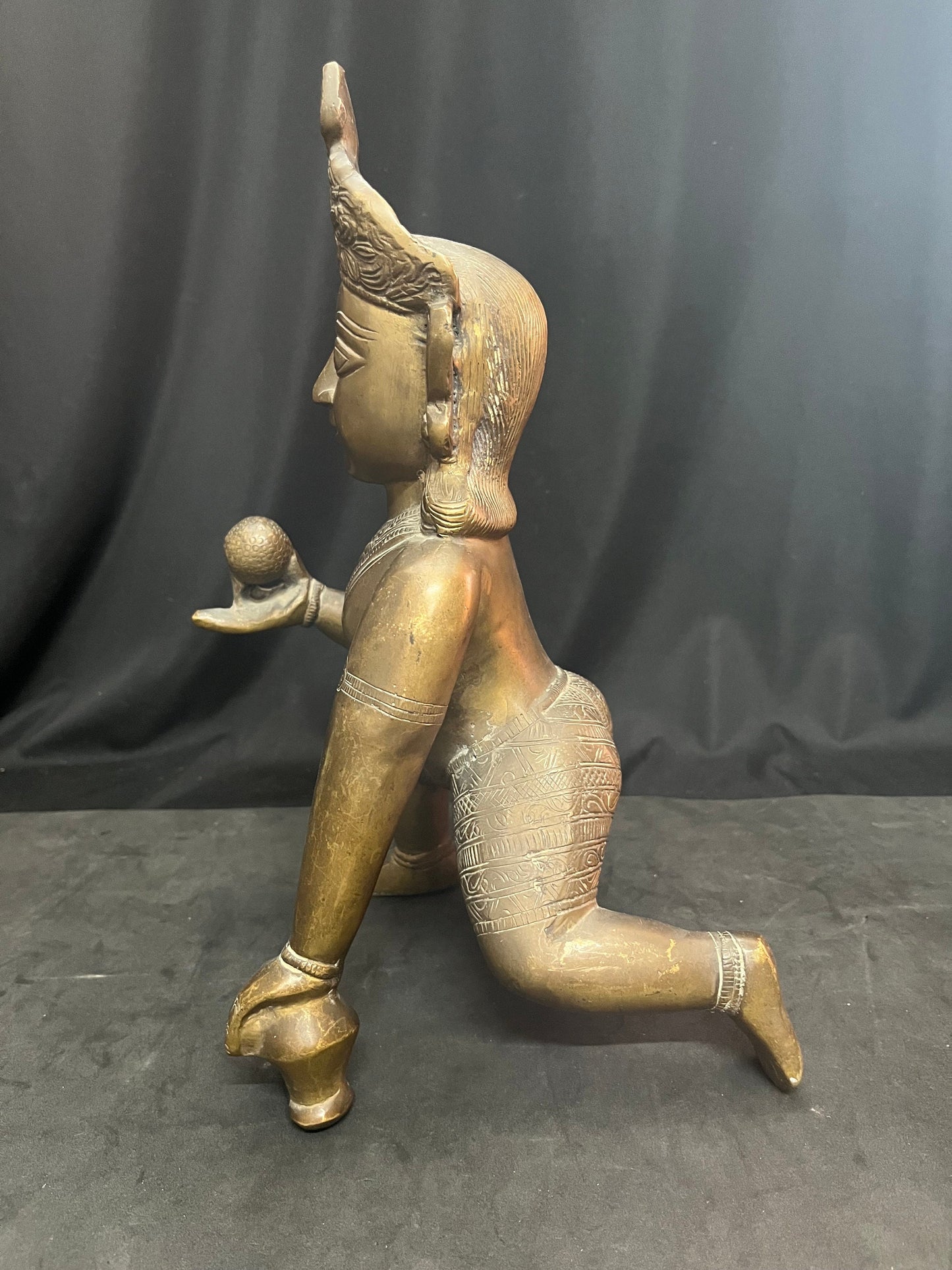 Vintage brass cast Crawling Krishna from deccan