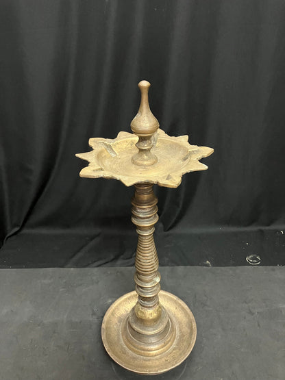 vintage bronze cast unique patterned oil lamp from south