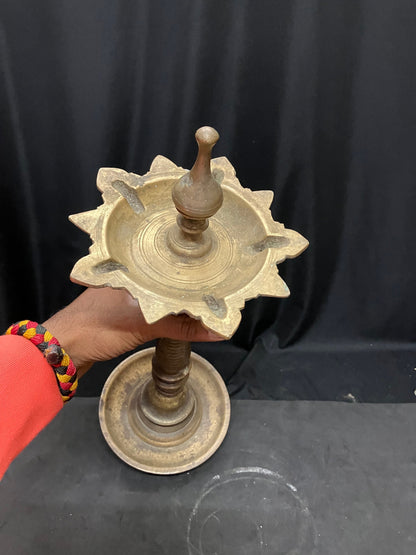 vintage bronze cast unique patterned oil lamp from south