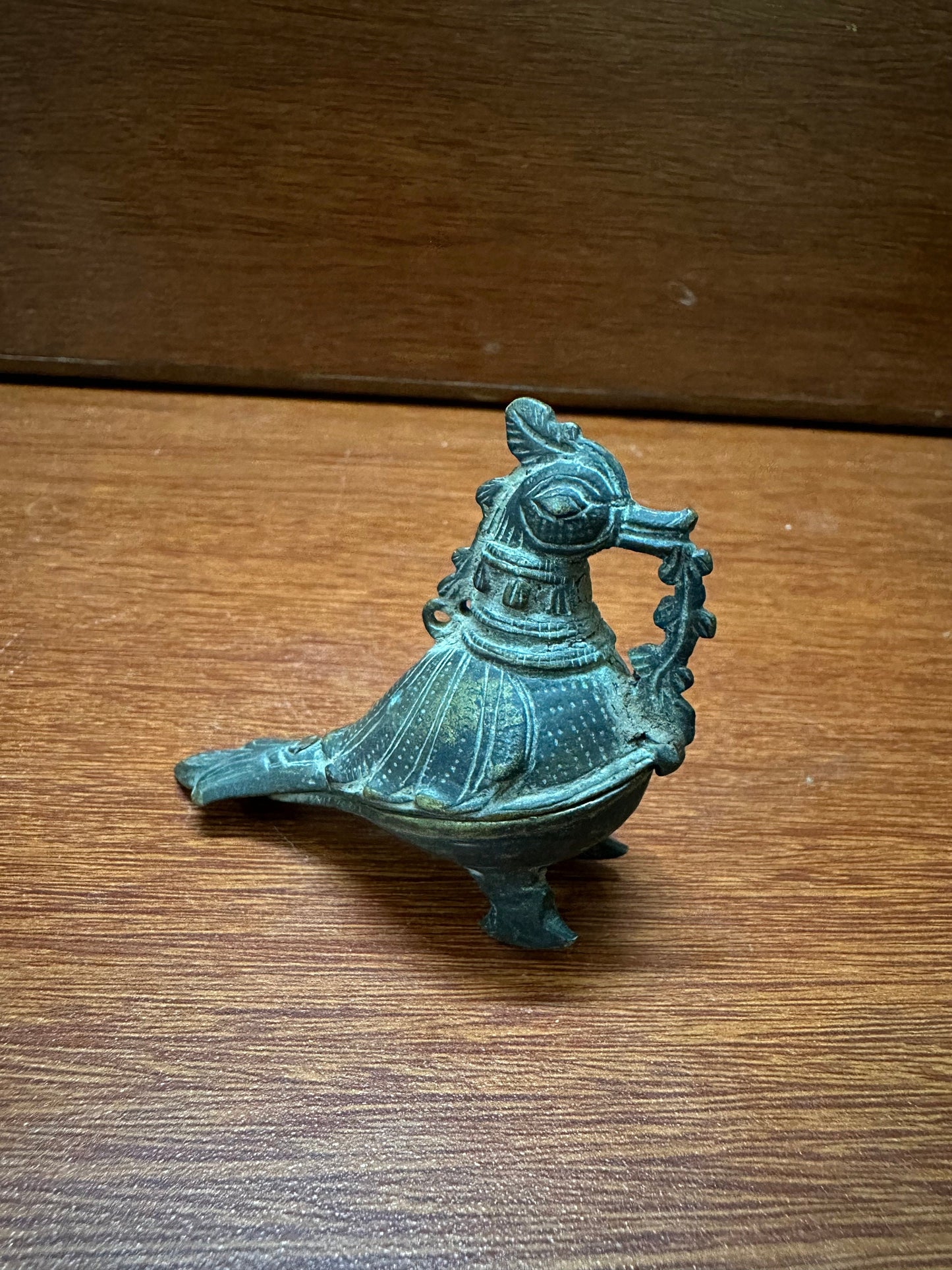 Vintage solid bronze cast kumkum container in a bird form from andhra