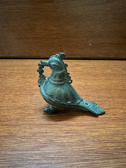 Vintage solid bronze cast kumkum container in a bird form from andhra