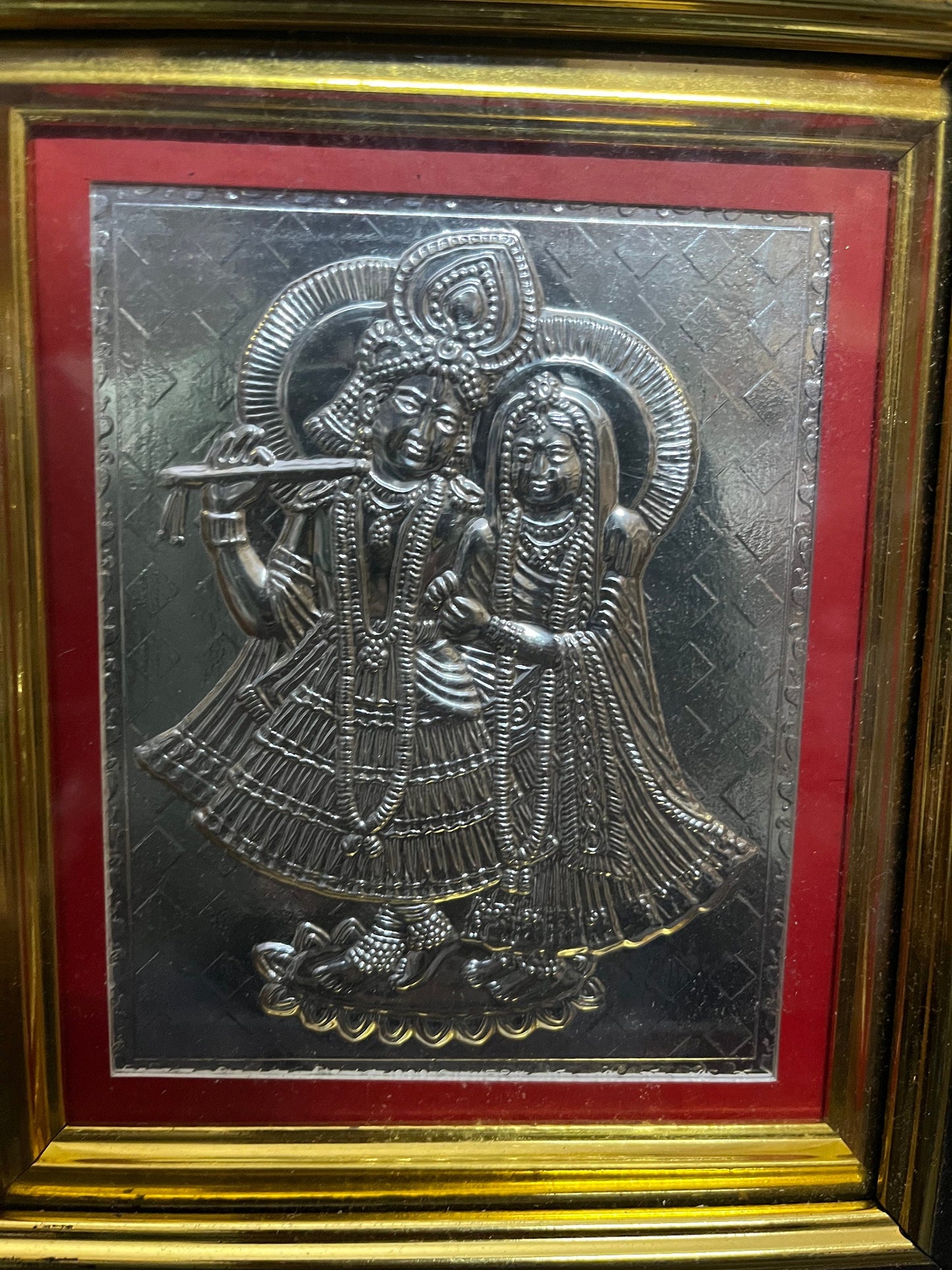 Silver sheet embossed radha krishna in a frame