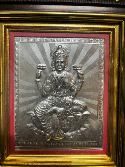 Silver embossed Lakshmi imprint in a frame