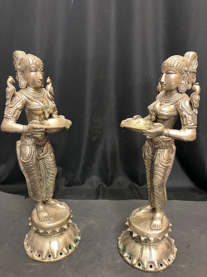 vintage bronze casted lady lamps / deepada mallis / deepa dharinis