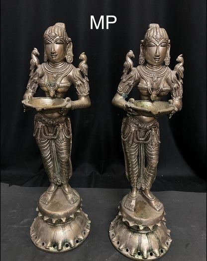 vintage bronze casted lady lamps / deepada mallis / deepa dharinis