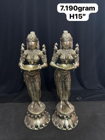 vintage bronze casted lady lamps / deepada mallis / deepa dharinis