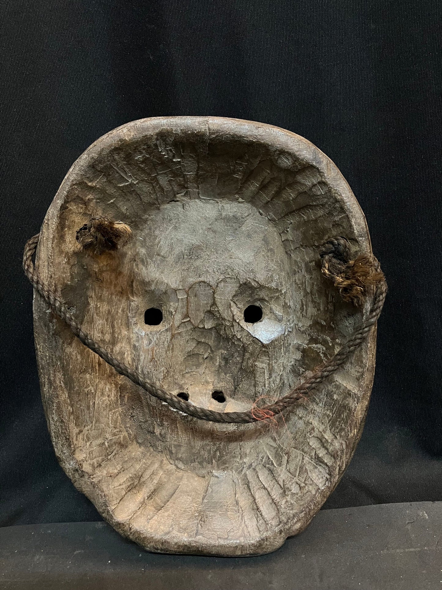 Vintage wooden mask made using single wood