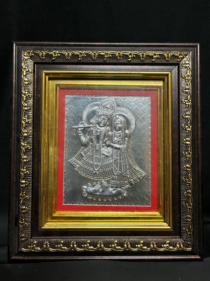 Silver sheet embossed radha krishna in a frame