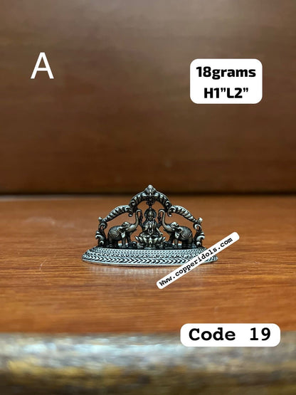 silver casted idol of lord ganesha lakshmi saraswati