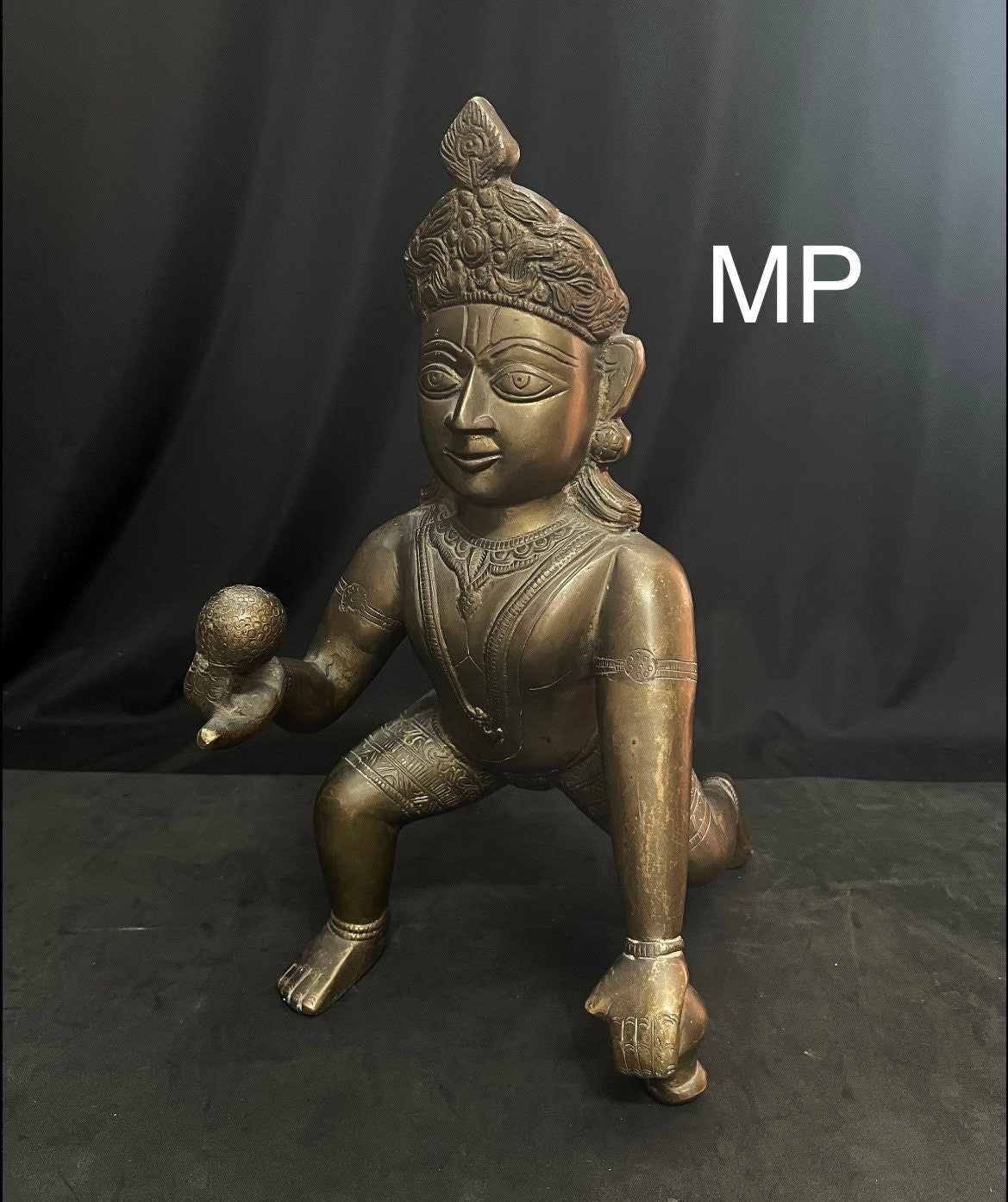 Vintage brass cast Crawling Krishna from deccan