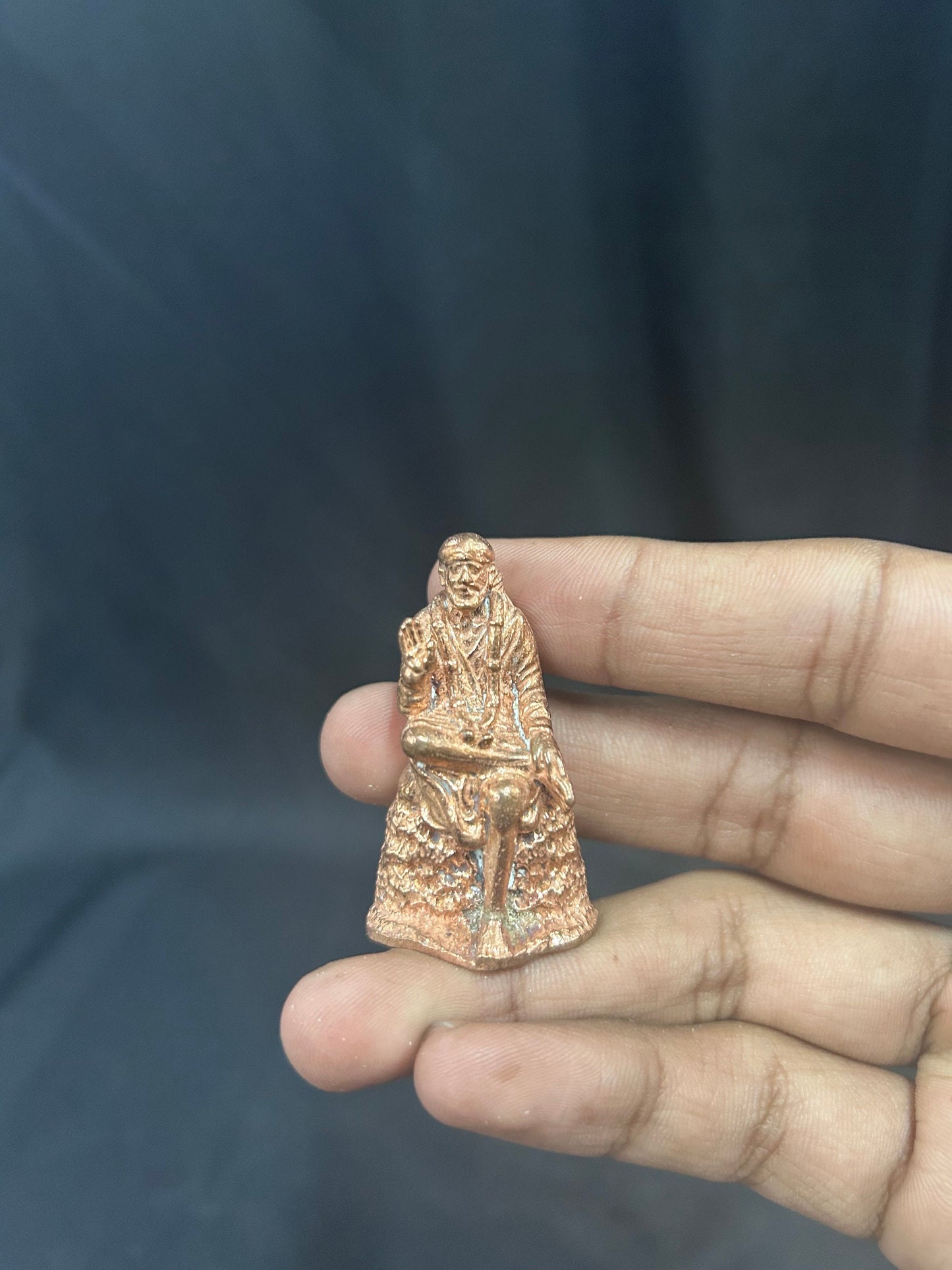 Copper casted idol of lord sai baba