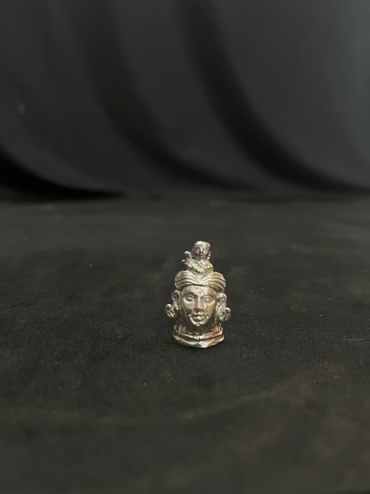 Prasiddh copper idol present silver idol of mukalinga / shiva face