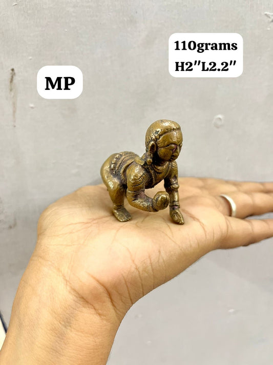 Vintage copper cast crawling krishna idol