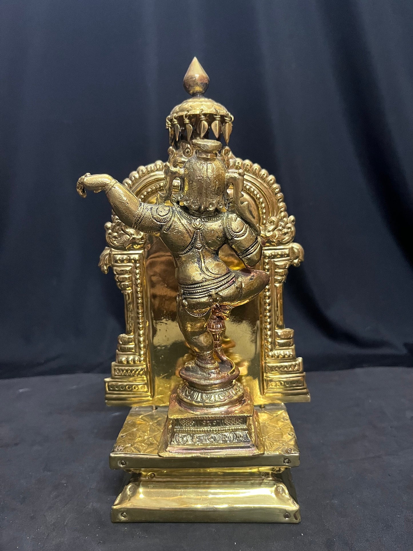 Panchaloha moorthy of Narthana Krishna on a peetam