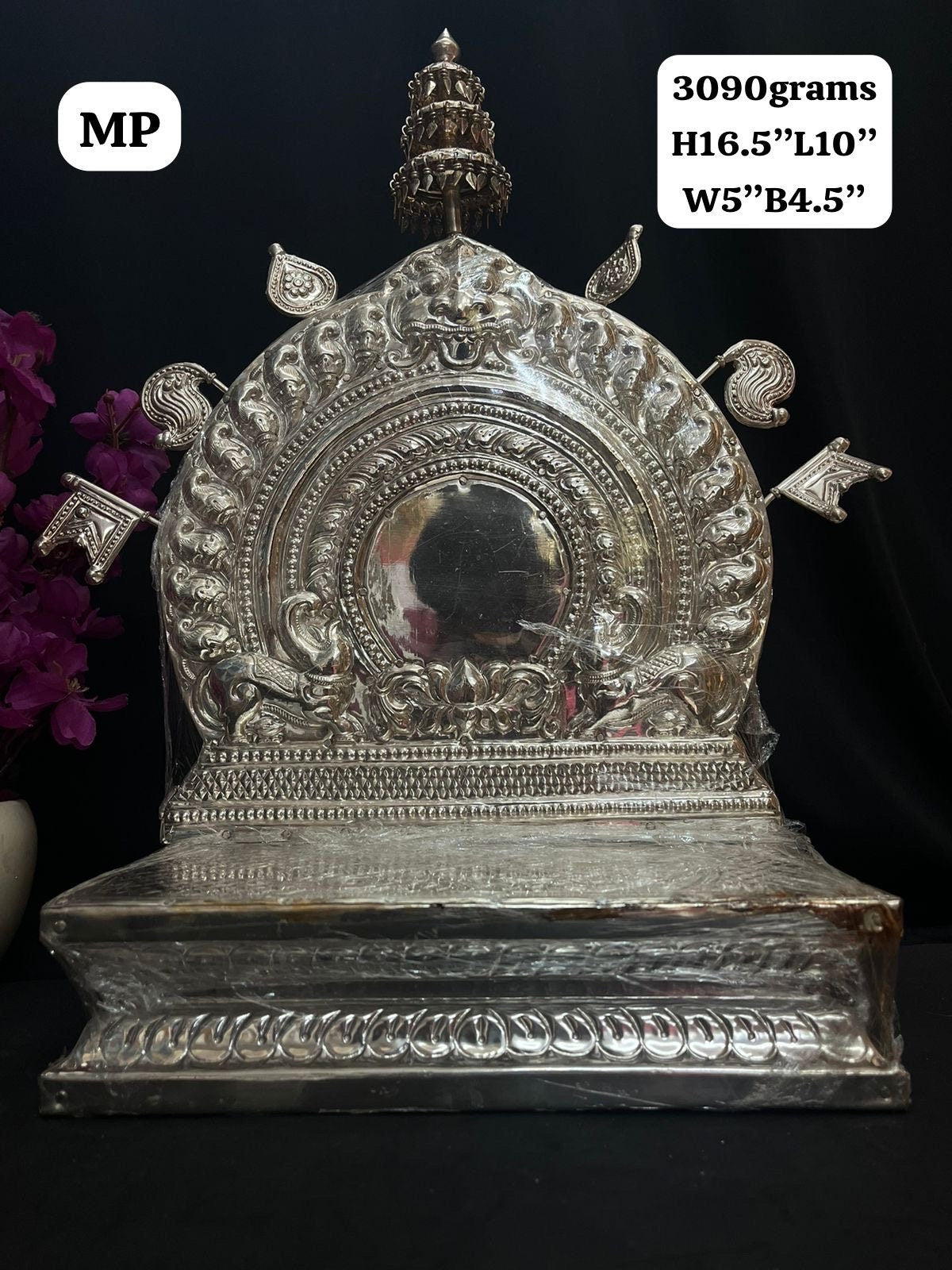 Silver made peeta prabhavali on a jack wood peetam