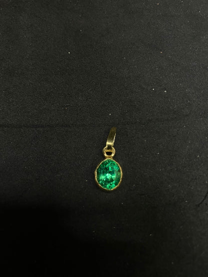 Silver made gold polished green stone pendant