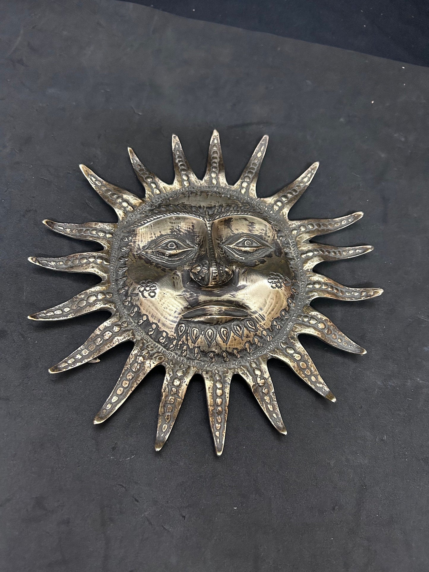 Vintage brass cast Surya idol wall mount