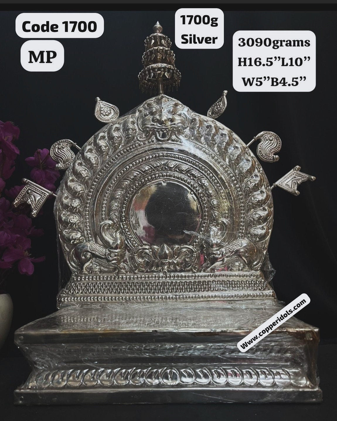 Silver made peeta prabhavali on a jack wood peetam