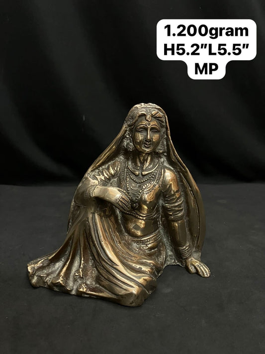 Vintage brass cast lady figurine