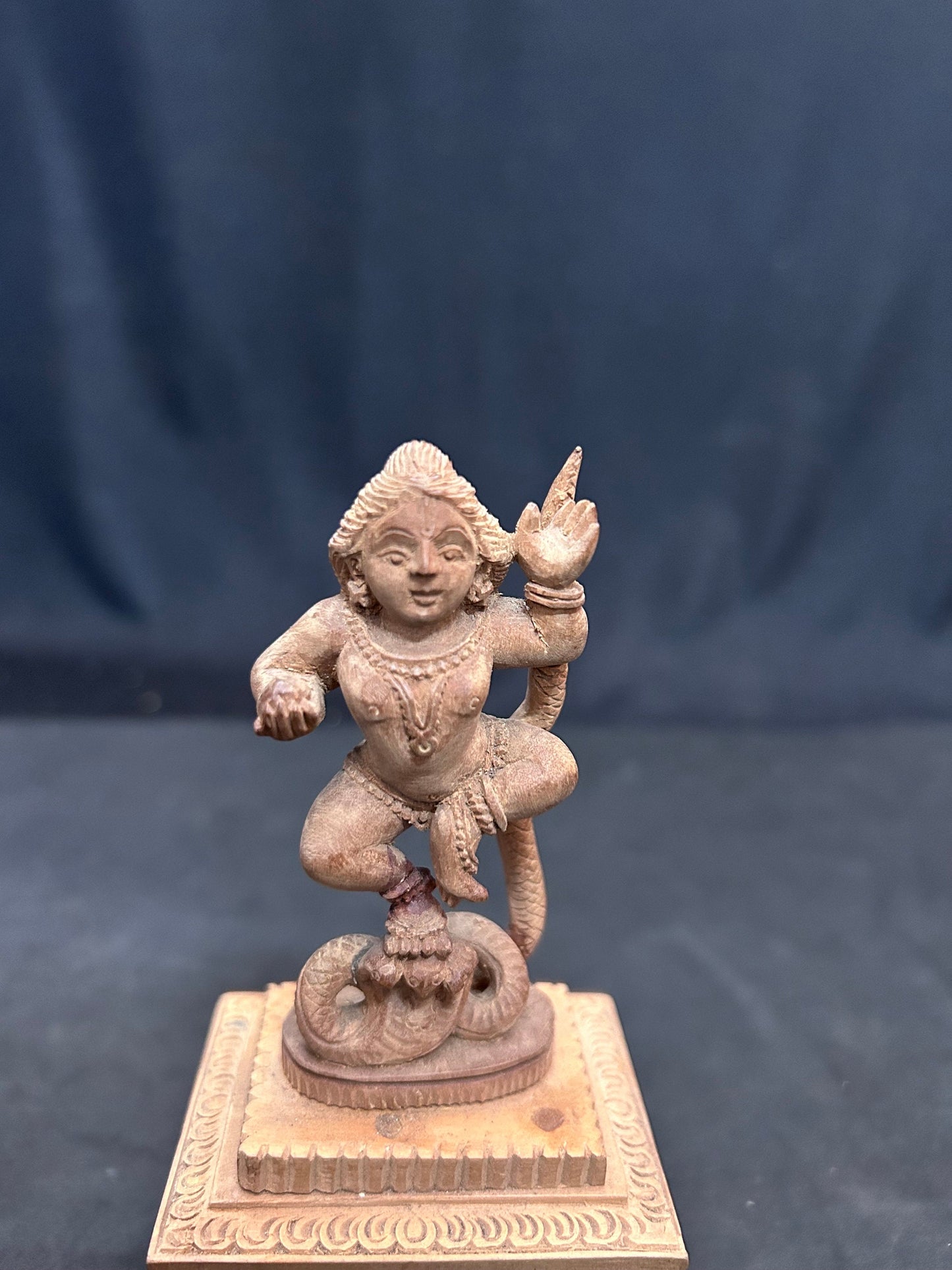 Sandalwood made intricately carved Kalinga nartha krishna idol