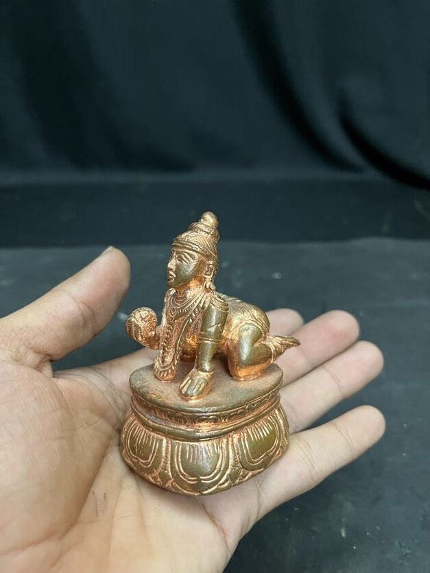 Prasiddh copper idols present copper idol of ambegalu butter ball krishna