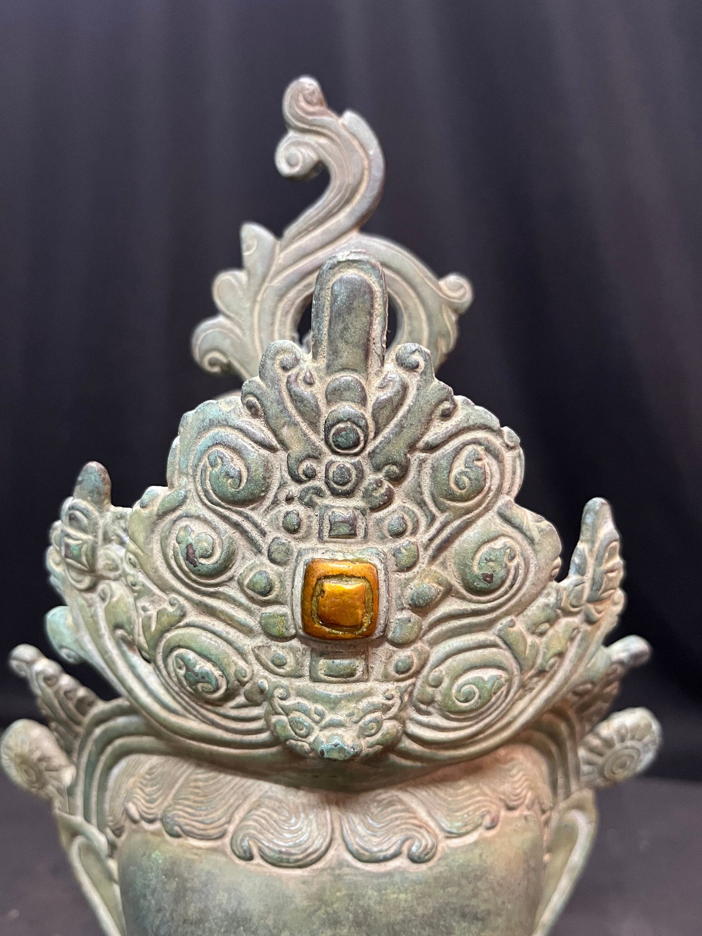 Brass cast Buddha mask with patina